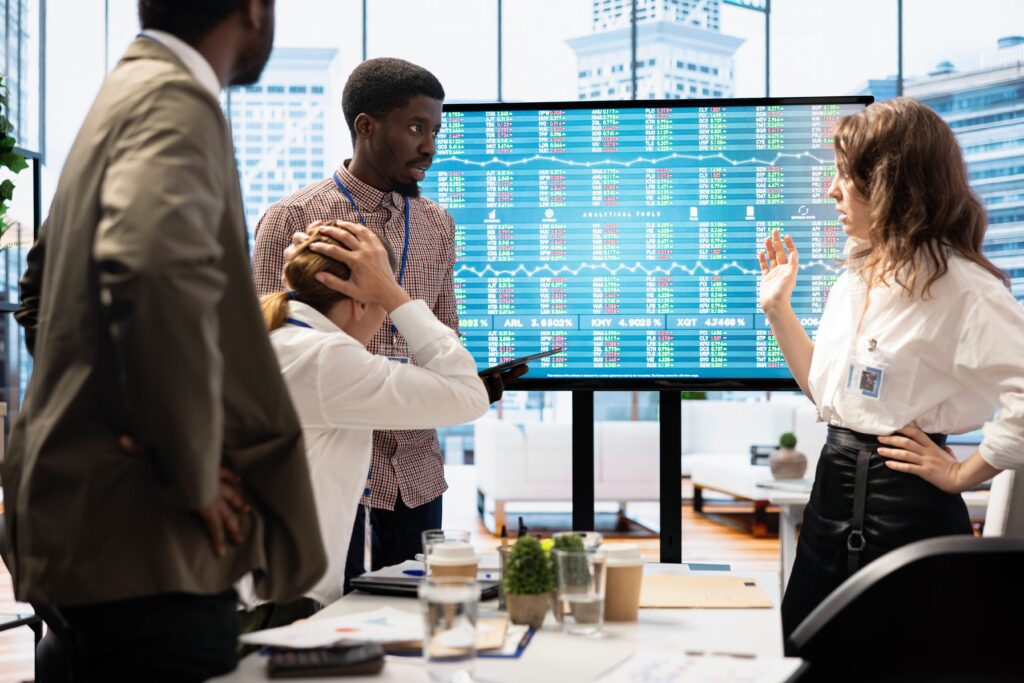 A diverse group of professionals discussing retirement planning strategies in a boardroom